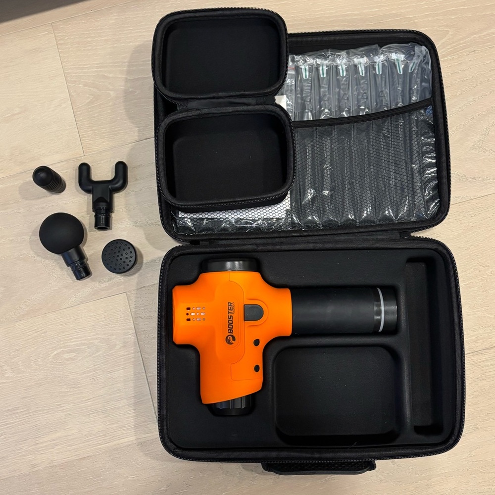 Massage gun with attachments and case
